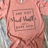 She got mad hustle and a dope soul tee